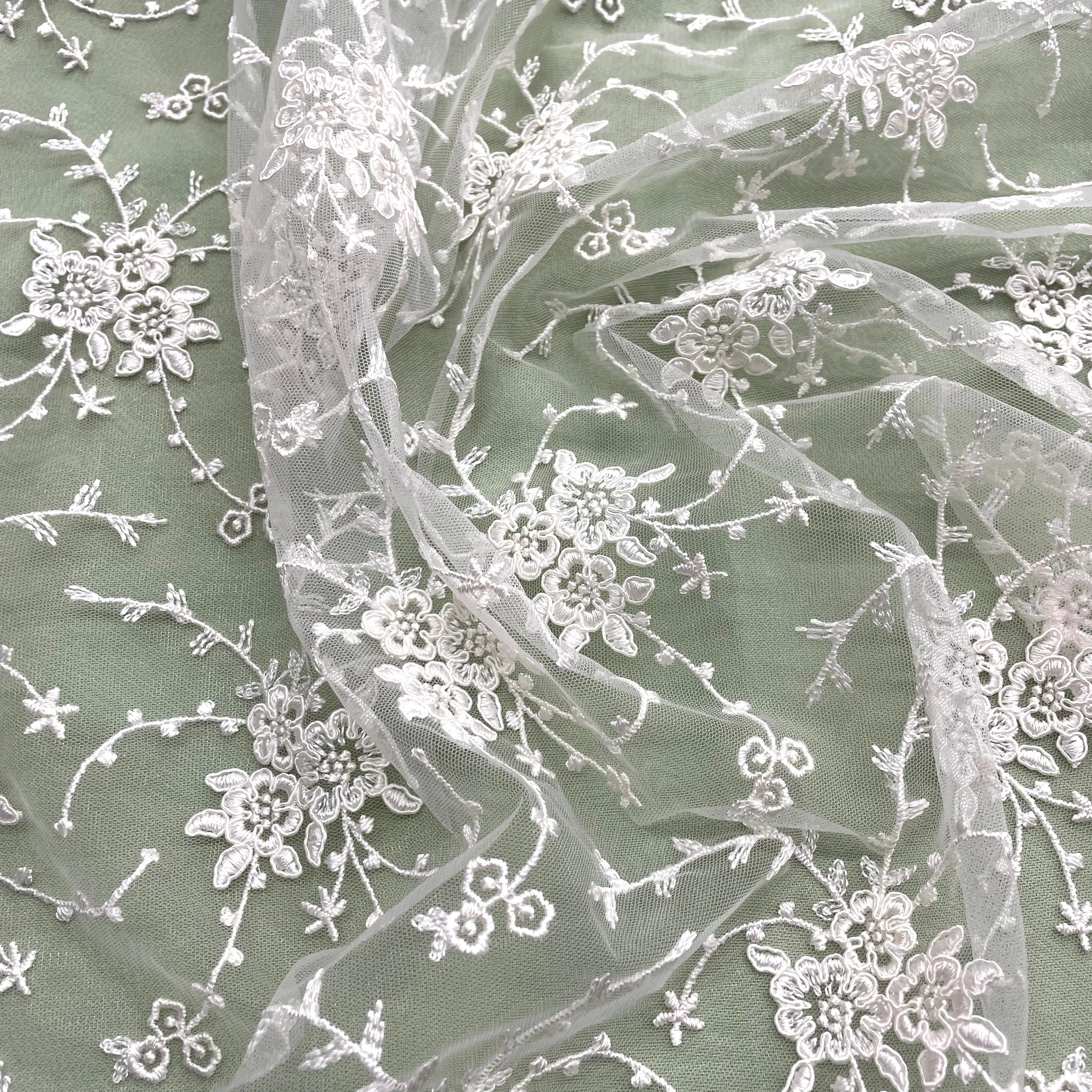 Corded Bridal Lace Fabric Embroidered on 100% Polyester Net Mesh | Lace USA - 95575W